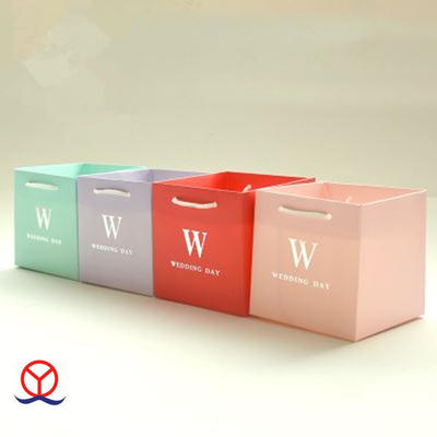 Chinese custom design flat bottom card paper wholesale luxury wedding gift candy paper bag